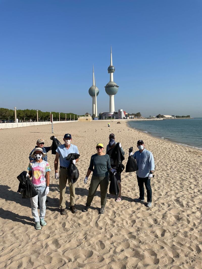 Alina L Romanowski, the US envoy to Kuwait, takes part in a cleanup campaign at Asheraj beach to mark World Cleanup Day. Photo: US ambassador to Kuwait