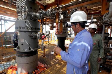 Workers at the Bukha A Oman oil field in Oman. Pawan Singh / The National