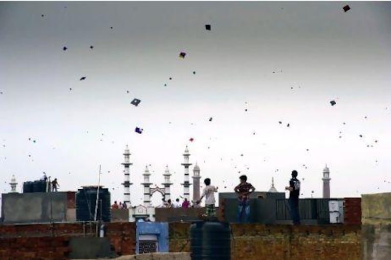 Kites outnumber even the birds on the skyline of Old Dehli on Monday as India celebrates its Independence Day.