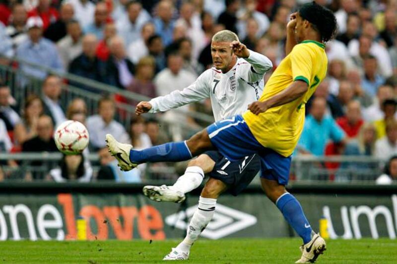 England's David Beckham (L) battles Brazil's Ronaldinho for the ball in their friendly international soccer match in the new Wembley Stadium in London June 1, 2007.     REUTERS/Eddie Keogh (BRITAIN)

Picture Supplied by Action Images