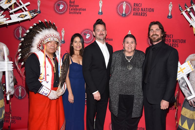 Chief Phillip Whiteman Jr, Rebecca Brando, Scott Cooper, Sacheen Littlefeather and Christian Bale at the 24th RNCI Red Nation International Film Festival and Awards Ceremony on November 15, 2019 in Beverly Hills, California. AFP