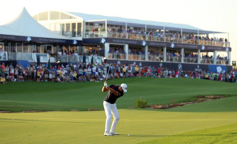 Henrik Stenson of Sweden plays his third shot on the 18th hole during the third round. Andrew Redington / Getty Images