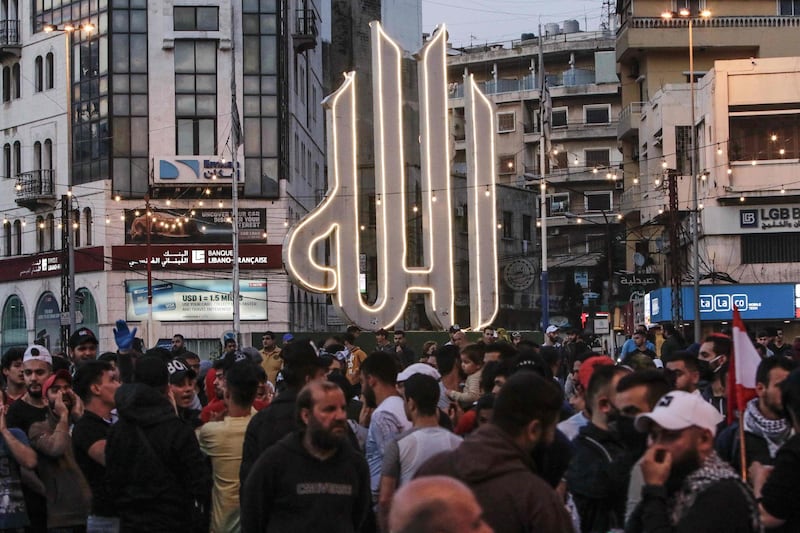 Several hundred Lebanese people protest in the northern city of Tripoli on April 17, 2020 despite the country's coronavirus lockdown. AFP