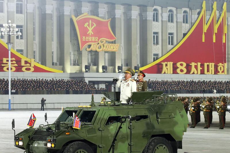 Ri Pyong Chol, left, vice-chairman of the Central Military Commission of the WPK, and Pak Jong Chon, chief of the General Staff of the Korean People's Army, during a military parade celebrating the 8th Congress of the Workers' Party of Korea in Pyongyang. KCNA / AFP