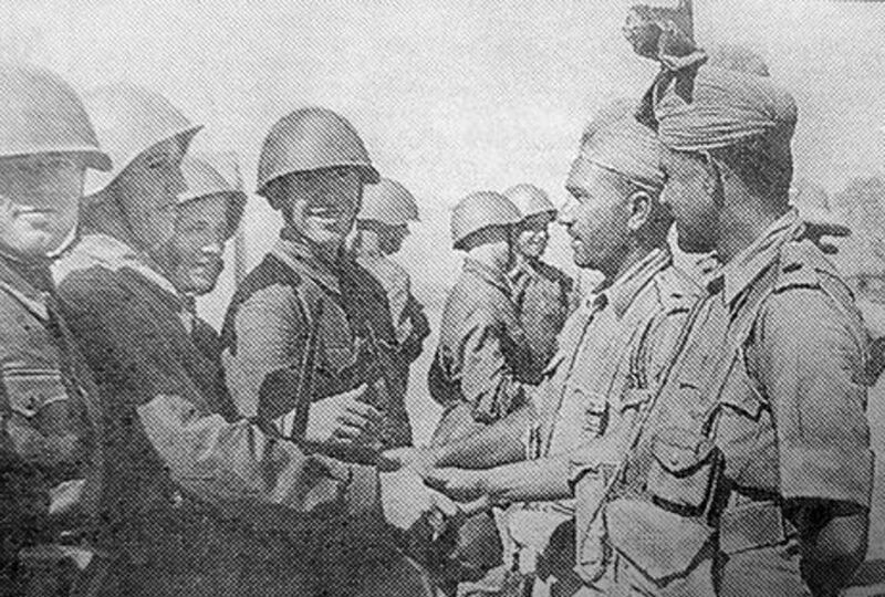 Soviet and British soldiers meet in Iran after the successful invasion, which was called Operation Countenance. Alamy