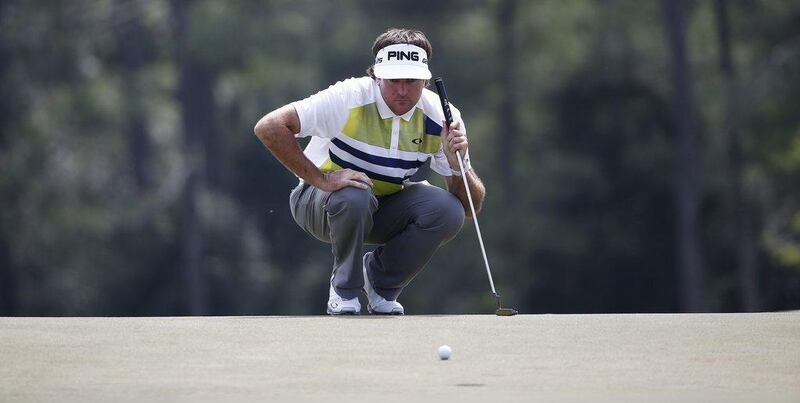 Bubba Watson lines up his putt on the 18th hole during the second round of the 2014 Masters Tournament at Augusta National in Augusta, Georgia, USA, on Friday. Tannen Maury / EPA / April 11, 2014  