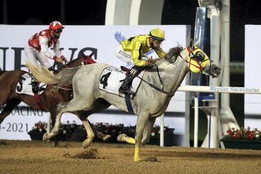 Bernardo Pinheiro guides Jayide Al Boraq to victory at Meydan Racecourse on Thursday. Pawan Singh / The National