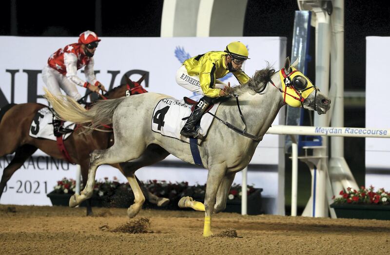 DUBAI , UNITED ARAB EMIRATES , November 19 – 2020 :- Bernardo Pinheiro  (no 4) guides Jayide Al Boraq (MA)  to win the 1st horse race 1400m Dirt at the Meydan Racecourse in Dubai. ( Pawan Singh / The National ) For Sports. Story by Amith