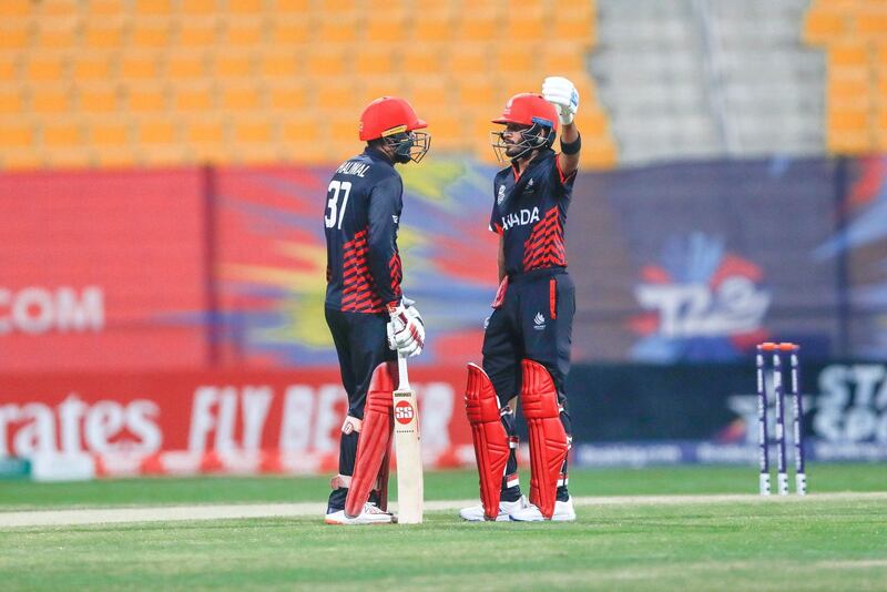 Abu Dhabi, United Arab Emirates, October 27, 2019.  
T20 UAE v Canada-AUH-
-- (R-L) Nitish Kumar and Navneet Dhaliwal of Canada discuss strategy during their match against the UAE.
Victor Besa/The National
Section:  SP
Reporter:  Paul Radley