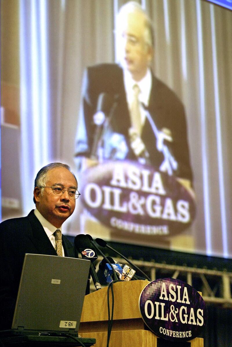 Then Malaysian deputy prime minister Najib Razak reads the keynote address during the opening ceremony of the Asia Oil and Gas Conference in Kuala Lumpur in 2004. AFP