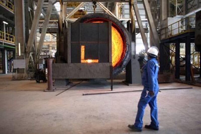 June 17, 2009 / Abu Dhabi / A steel worker at Emirates Steel Industries in Musaffah June 17, 2009. (Sammy Dallal / The National)



 *** Local Caption ***  sd-061709-steel-05.jpgBZ07SE B1 GDP 01.jpg