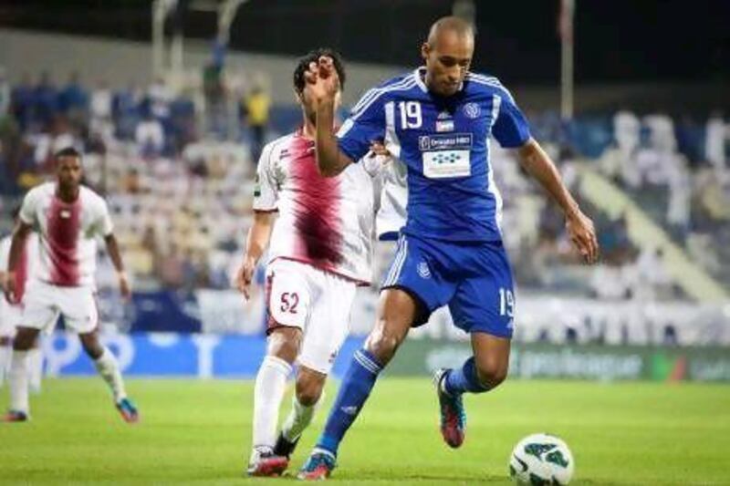Al Nasr's Bruno Cesar scored a hat-trick as the home side beat Al Wahda and climbed to second in the table. Razan Alzayani / The National