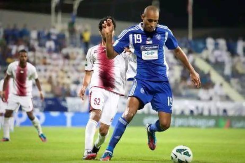 Al Nasr's Bruno Cesar scored a hat-trick as the home side beat Al Wahda and climbed to second in the table. Razan Alzayani / The National