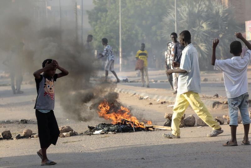 Tyres are set ablaze by Sudanese protesters. AFP