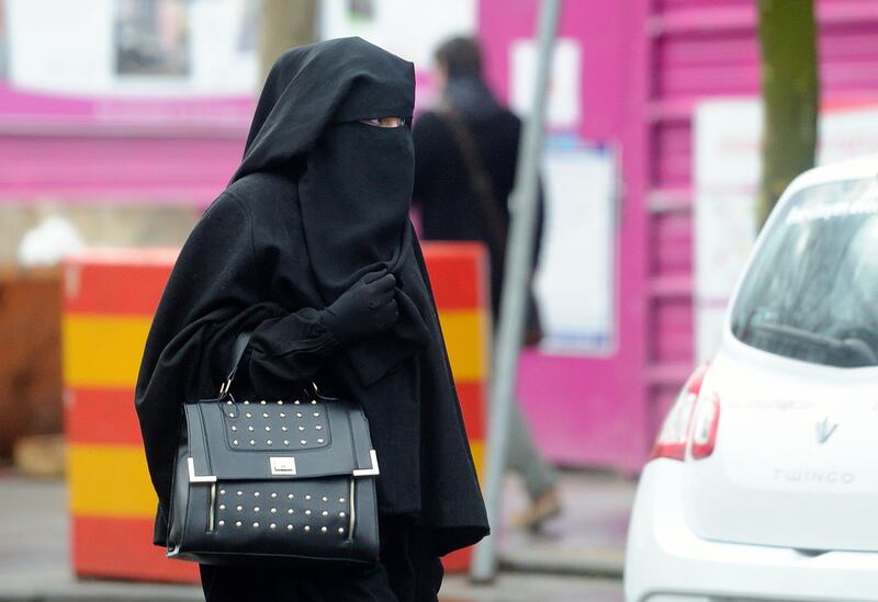 A woman wearing a niqab in the center of Roubaix, northern France. Philippe Huguen / AFP