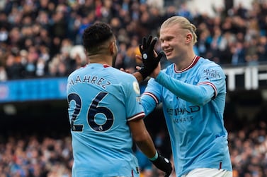 Manchester City's Erling Haaland (R) celebrates with team-mate Riyad Mahrez
after scoring the first goal during the English Premier League soccer match between Manchester City and Wolverhampton Wanderers at the Etihad stadium in Manchester, Britain, 22 January 2023.   EPA/PETER POWELL EDITORIAL USE ONLY.  No use with unauthorized audio, video, data, fixture lists, club/league logos or 'live' services.  Online in-match use limited to 120 images, no video emulation.  No use in betting, games or single club / league / player publications