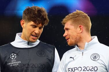 Soccer Football - Champions League - Quarter Final - First Leg - Manchester City v Atletico Madrid - Etihad Stadium, Manchester, Britain - April 5, 2022 Manchester City's Kevin De Bruyne with John Stones during the warm up before the match Action Images via Reuters / Lee Smith