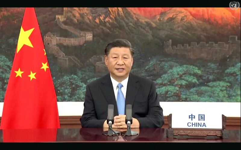 In this image made from UNTV video, Chinese President Xi Jinping speaks in a pre-recorded message which was played during the 75th session of the United Nations General Assembly, Tuesday, Sept. 22, 2020, at U.N. headquarters in New York. The U.N.'s first virtual meeting of world leaders started Tuesday with pre-recorded speeches from some of the planet's biggest powers, kept at home by the coronavirus pandemic that will likely be a dominant theme at their video gathering this year. (UNTV via AP)