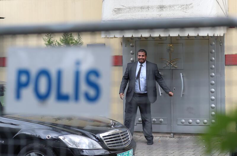 epa07078461 Saudi official closes the door in Saudi consulate in Istanbul, Turkey, 08 October 2018. Turkish President Recep Tayyip Erdogan on 07 October said he is following the developments on the disappearance of Saudi journalist Jamal Khashoggi who has gone missing after visiting the Saudi consulate in Istanbul on 02 October to complete routine paperwork.  EPA/TOLGA BOZOGLU