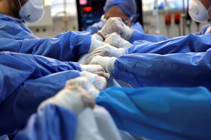 Medical workers move a patient at the intensive care unit of the Sotiria hospital in Athens, Greece. Reuters