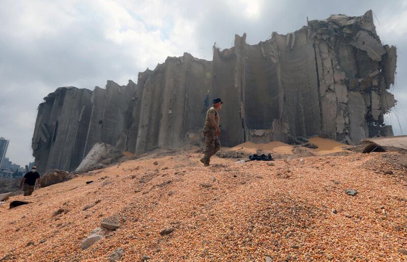 Lebanese army members walk near the damaged grain silo at the site of Tuesday's blast, at Beirut's port area, Lebanon, August 7, 2020. REUTERS/Mohamed Azakir     TPX IMAGES OF THE DAY