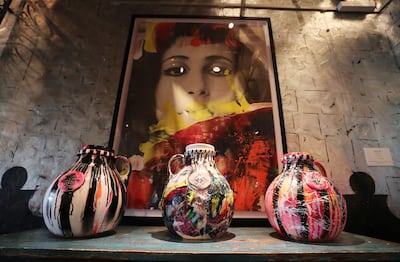 The Pisco jars at Coya Dubai, painted by regional artists such as Farida Abushady and Moza Almansoori. Chris Whiteoak / The National