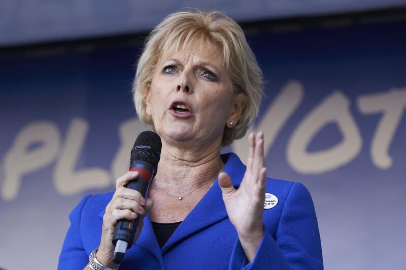 (FILES) In this file photo taken on October 20, 2018 Conservative member of parliament Anna Soubry speaks to demonstrators in Parliament Square after they take part in a march calling for a People's Vote on the final Brexit deal, in central London on October 20, 2018. Three MPs quit UK governing Conservative Party over Brexit, Sarah Wollaston, Anna Soubry and Heidi Allen the three announced on February 20, 2019. / AFP / NIKLAS HALLE'N
