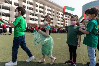 Pupils at Gems Al Khaleej International School, Al Garhoud, Dubai, dressed with the colours of the UAE flag.  Antonie Robertson / The National

