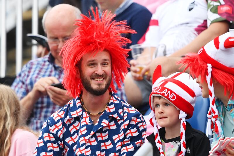 Spectators wear team England-themed hats before the opening ceremony. Getty