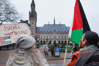 Protesters outside the International Court of Justice in The Hague during hearings on the legal consequences of Israel's occupation of the Palestinian territories. Reuters
