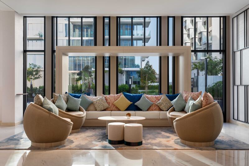 Comfortable couches for guests to relax in until their check-in is complete