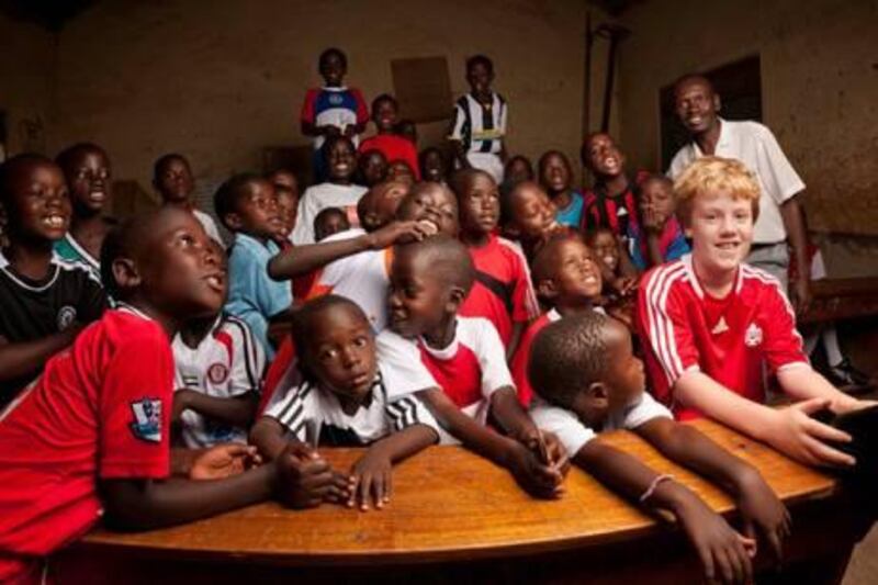 Lachlan MacPherson a pupil at the American School of Dubai who collected football shirts to donate to Masooli School in Uganda.

Courtesy XXXXXX