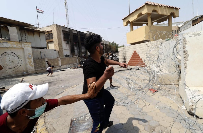 Iraqi protesters demonstrate against their government and the lack of basic services, in Basra. AFP