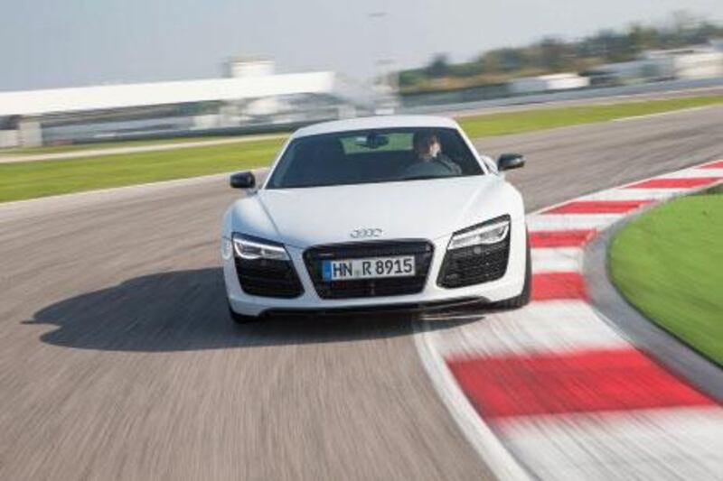 A 2014 Audi R8 could be yours when you buy a Dubai apartment at Boulevard Tower or Ocean Heights with Damac.