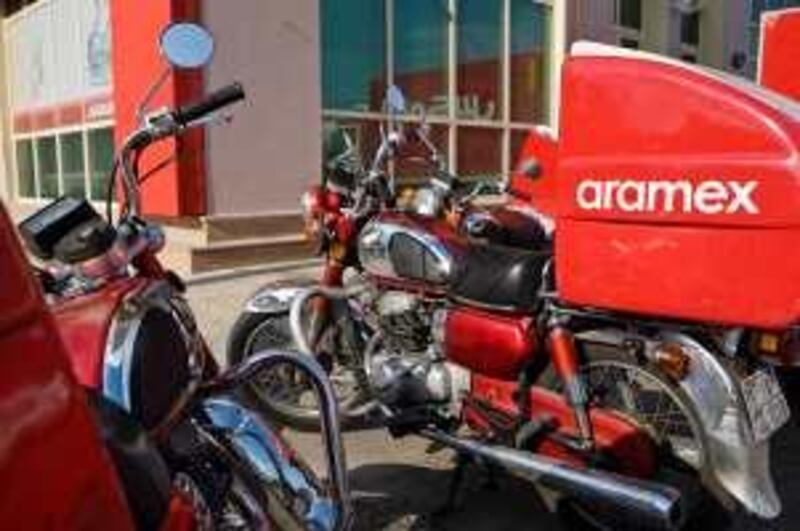 Abu Dhabi - December 7, 2008: Aramex delivery bikes. ( Philip Cheung / The National ) *** Local Caption ***  PC0089-Stock.jpgPC0089-Stock.jpg