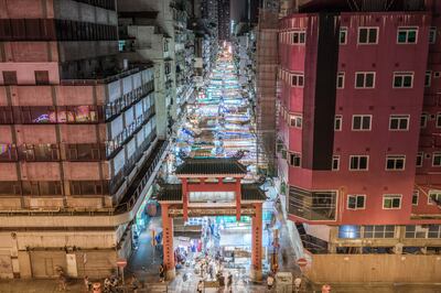 Temple Street market at night, Mongkok, Hong Kong. Getty Images