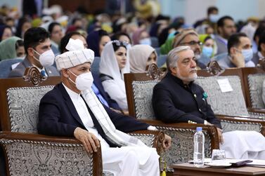 Afghan President Ashraf Ghani, left, and  Abdullah Abdullah, chairman of the High Council for National Reconciliation, attend the loya jirga held in Kabul to decide the fate of Taliban prisoners. Press Office of President of Afghanistan / AFP