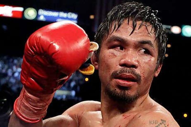 Margarito is expected to face Pacquiao, above, for a junior middleweight title on November 13.