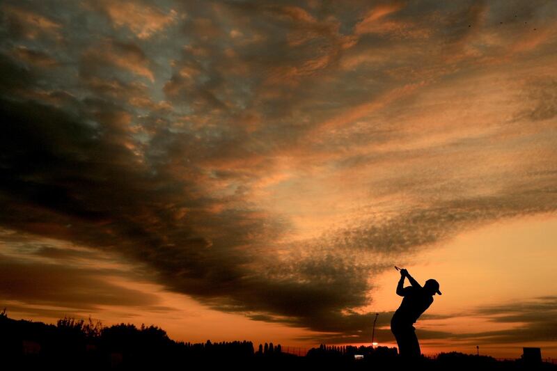 Thorbjorn Olesen of Europe practices on the range in Paris, France. Mike Ehrmann / Getty Images