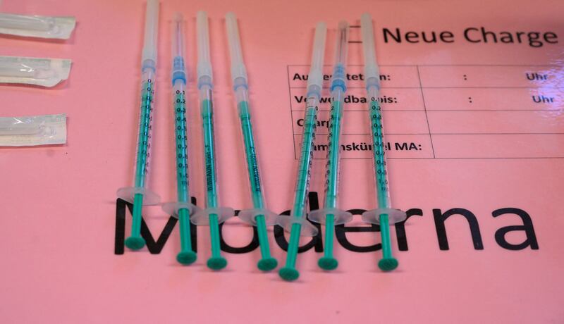 Syringes filled with the Moderna Covid-19 vaccine are seen at a mobile vaccination center in Hemmingen, Ludwigsburg, in southern Germany. AFP
