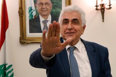 Lebanese Foreign Minister Nassif Hitti, gestures as he prepares to leave his office after he announced his resignation at the foreign ministry, in Beirut, Lebanon, Monday, August 3, 2020. AP