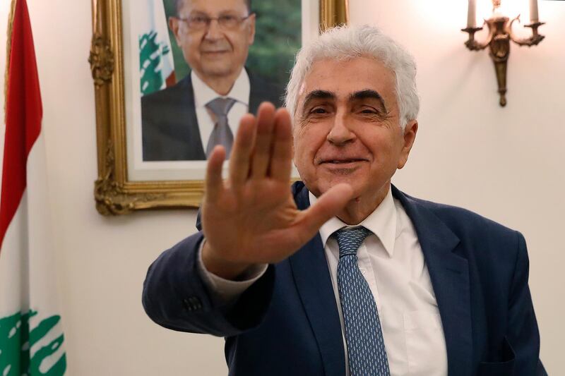 Lebanese Foreign Minister Nassif Hitti, gestures as he prepares to leave his office after he announced his resignation at the foreign ministry, in Beirut, Lebanon, Monday, Aug. 3, 2020. Hitti resigned on Monday amid the severe economic crisis gripping the crisis-wracked Arab country, warning a lack of vision and a will to make changes risked turning the country into a "failed state." (AP Photo/Hussein Malla)