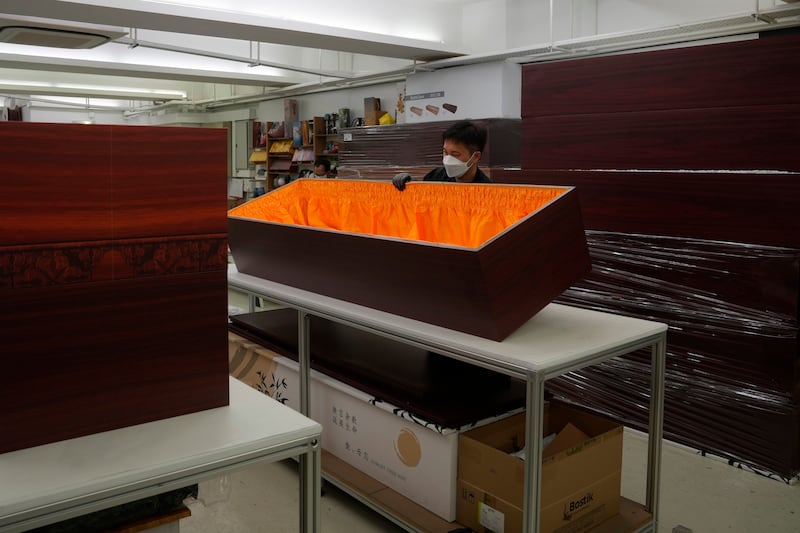 LifeArt Asia's cardboard coffins are made of recycled wood fibre that can be customised with designs on the exterior and the company can make up to 50 coffins a day.