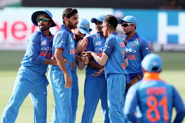 DUBAI , UNITED ARAB EMIRATES, September 19 , 2018 :- Bhuvneshwar Kumar ( 2nd left ) of India celebrating after taking the wicket of Imam ul Haq during the Asia Cup UAE 2018 cricket match between Pakistan vs India held at Dubai International Cricket Stadium in Dubai. ( Pawan Singh / The National ) For Sports. Story by Paul