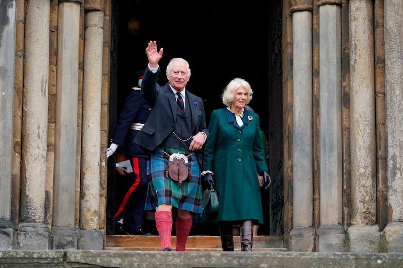 King Charles and the Queen Consort leave Dunfermline Abbey, after a visit to mark its 950th anniversary. AP