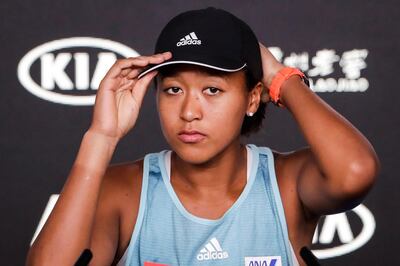epa07276397 Naomi Osaka of Japan adjusts her hat during a press conference ahead of the Australian Open tennis tournament in Melbourne, Australia, 12 January 2019.  EPA/MAST IRHAM