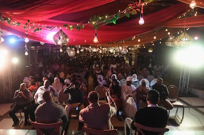 Sudanese refugees attending a cultural event at a restaurant in Cairo's Manial district. AFP