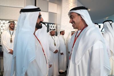 YAS ISLAND, ABU DHABI, UNITED ARAB EMIRATES - November 26, 2017: HH Sheikh Mohamed bin Rashid Al Maktoum, Vice-President, Prime Minister of the UAE, Ruler of Dubai and Minister of Defence (L) speaks with HH Sheikh Abdullah bin Zayed Al Nahyan, UAE Minister of Foreign Affairs and International Cooperation (R), on the final day of  Formula 1 Etihad Airways Abu Dhabi Grand Prix, at Shams Tower. 

( Omar Al Askar  for The Crown Prince Court - Abu Dhabi )
---