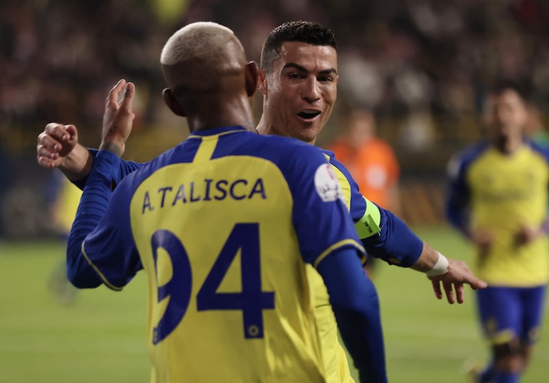 Cristiano Ronaldo celebrates Anderson Talisca's winning goal. Reuters