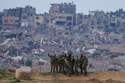 Female Israeli soldiers pose for a selfie at a position on the Gaza border. AP